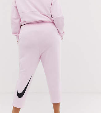 Nike plus pink swoosh track pants
