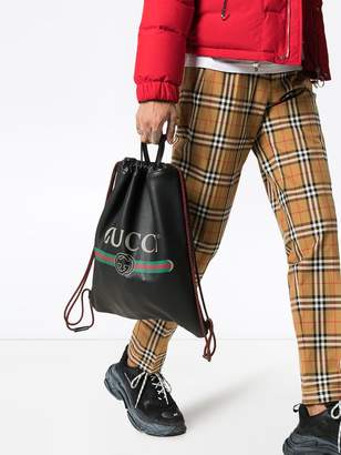 Gucci black leather drawstring backpack bag