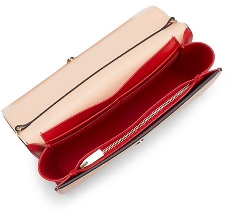 paloma spiked leather clutch