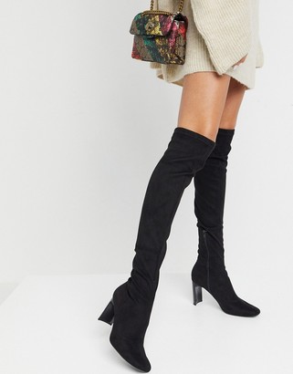Bershka high leg heeled boots in black - ShopStyle
