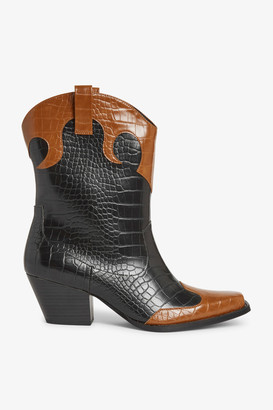 monki zip heeled platform boot in black