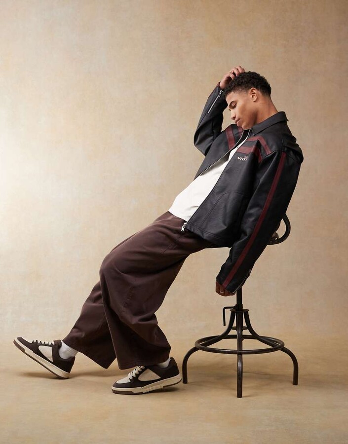 ASOS DESIGN faux leather boxy oversized motocross jacket in black with burgundy stripes