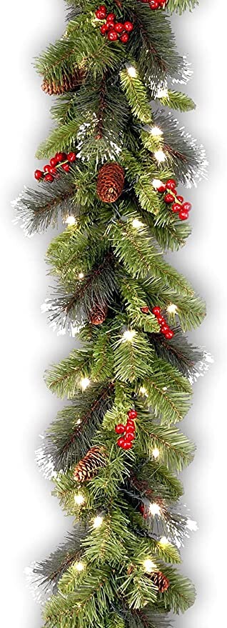 National Tree Company Pre-Lit Artificial Christmas Garland, Green, Crestwood Spruce, White Lights, Decorated with Pine Cones, Berry Clusters, Plug In, Christmas Collection, 9 Feet