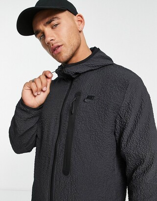 Nike textured tech fleece woven zip thru jacket in black - ShopStyle