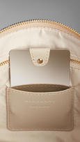Thumbnail for your product : Burberry Large Embossed Check Leather Beauty Wallet