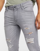 Thumbnail for your product : Jack and Jones Intelligence Liam skinny fit ripped jeans in light grey