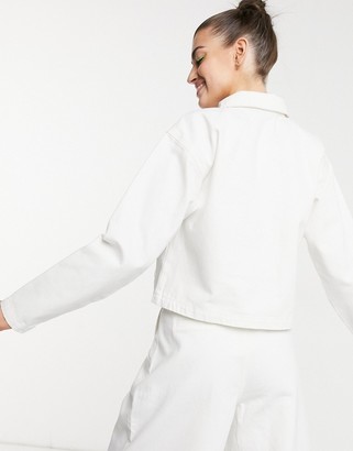 Aligne organic cotton denim jacket with pocket detail in ecru