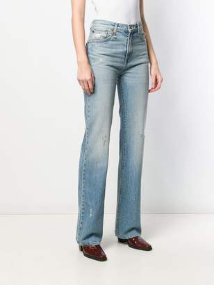 R 13 distressed flared jeans