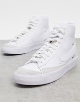 Thumbnail for your product : Nike Blazer Mid 77 trainers with metallic mini swoosh in white