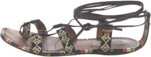 Valentino Leather Gladiator Sandals Black Printed Studded Accents Platform Wrap-Around Straps & Tie Closures Unfortunately, due to restrictions, this item may not be eligible for shipping in all areas.