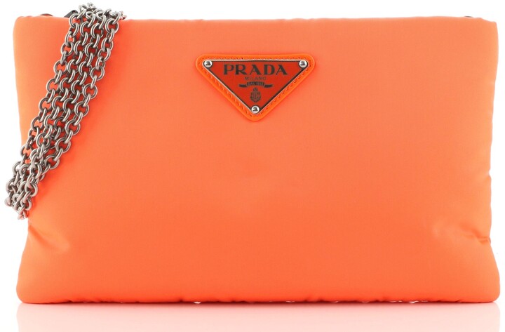 prada orange clutch