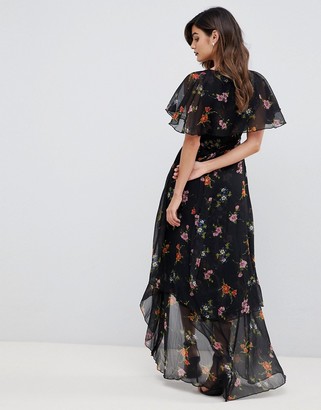 ASOS DESIGN maxi dress with cape back and dipped hem in dark black floral