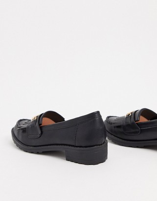 Raid Kiltie fringed flat loafers in black with gold trim