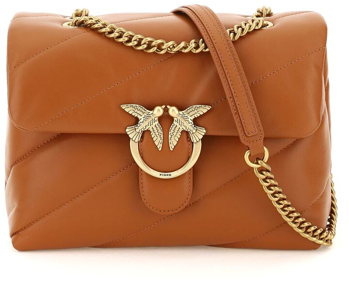 brown bolsa with gold chain