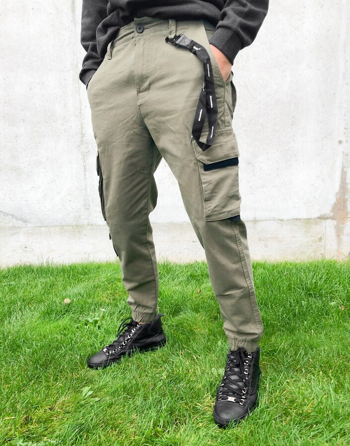 Bershka cargo pants with black trim detail in khaki - ShopStyle