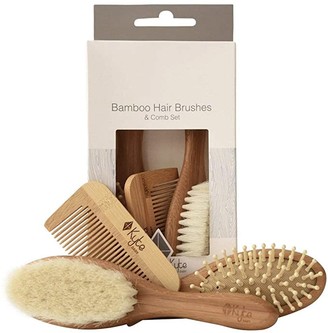 https://img.shopstyle-cdn.com/sim/ab/22/ab223a708db6dd76204d98da0494218a_xlarge/kyte-baby-bamboo-3-piece-brush-set-1-goat-hair-brush-1-wooden-bristle-brush-and-1-bamboo-comb.jpg