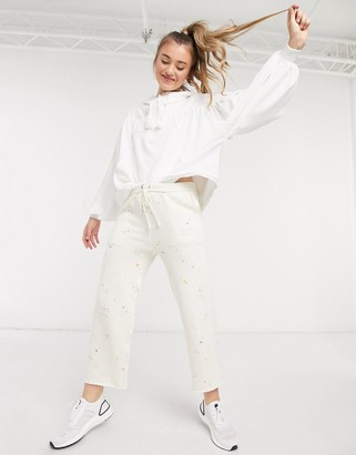FREE PEOPLE MOVEMENT sideline printed joggers in ivory