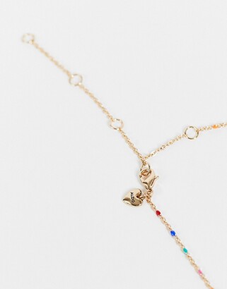 Aldo Ybendawen layering necklaces with evil eye in gold