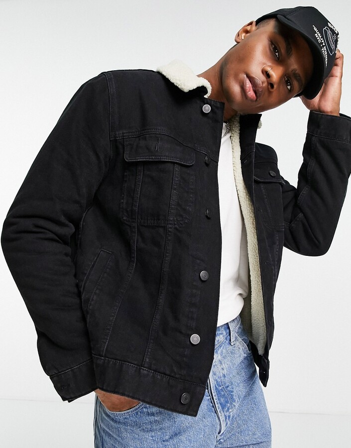 ASOS DESIGN denim jacket with ecru shearling lining in black - ShopStyle