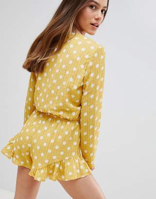 Glamorous Petite Playsuit With Frill Shorts And Bow Front In Polka Dot