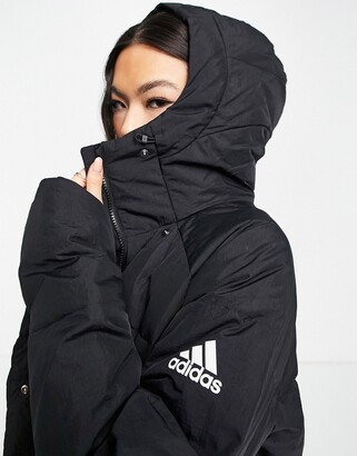 adidas Outdoor longline down puffer jacket in black - ShopStyle