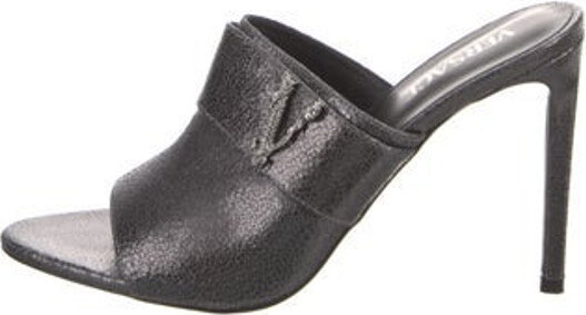 Versace Leather Slides Silver Unfortunately due to restrictions this item may not be eligible for shipping in all areas.