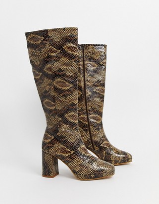 Topshop heeled knee high boots in snake print
