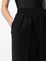 Thumbnail for your product : GOODIOUS Slit-Cuff Twill Trousers
