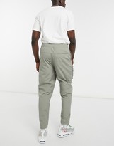 Thumbnail for your product : Nike City Made Pack woven cargo joggers in khaki