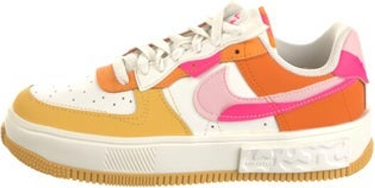 Nike Leather Low Top Athletic Sneakers White Colorblock Pattern Rubber Trim Round-Toes Platform Lace-Up Closure at Uppers Unfortunately, due to restrictions, this item may not be eligible for shipping in all areas.