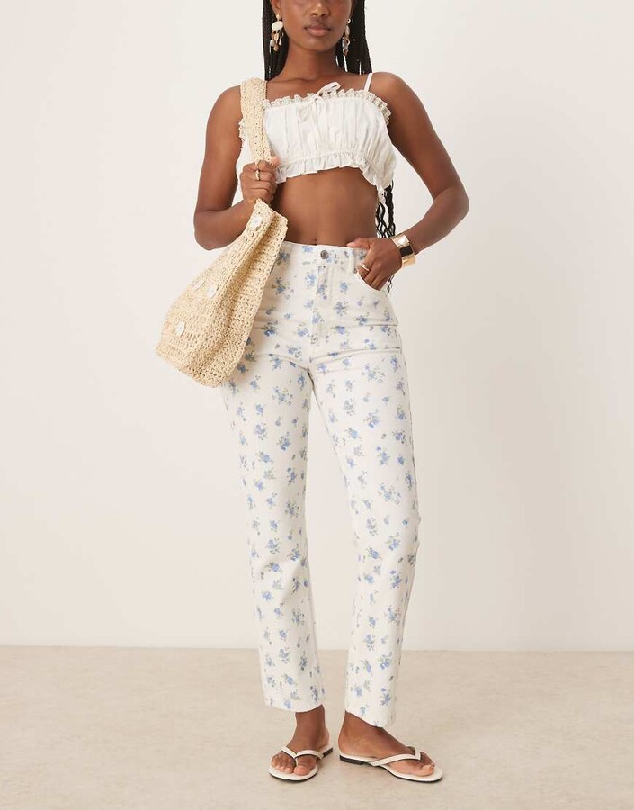 ASOS DESIGN mid rise straight leg jeans in floral print