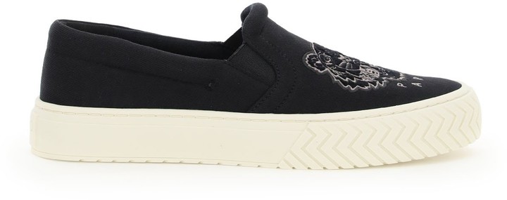 laceless white trainers