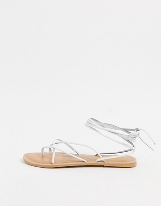 Rule London leather strappy tie leg sandals in white