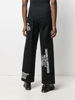 Thumbnail for your product : Sankuanz Slogan-Print Flared Trousers