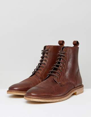 ASOS DESIGN lace up boots in tan leather with natural sole