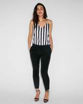 Thumbnail for your product : Express Mid Rise Ruffle Pocket Columnist Ankle Pant