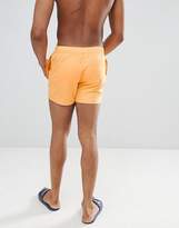 Thumbnail for your product : ASOS DESIGN swim shorts in orange in short length