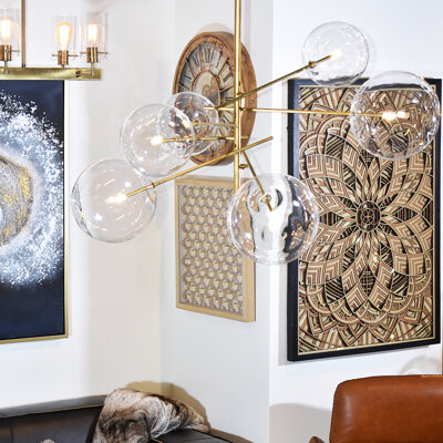 Corrigan Studio Inia Klare 6-Light Sputnik Chandelier In Antique Brass Finish With Clear Glass Spheric Shades And Adjustable Arms