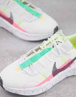 Nike Crater Impact trainers in off-white and neon tones