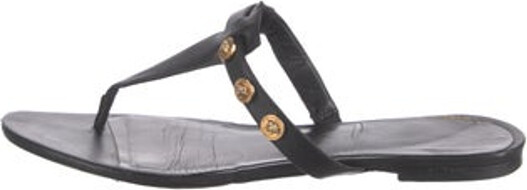 Versace Leather Slides Black & Gold Studded Accents Unfortunately, due to restrictions, this item may not be eligible for shipping in all areas.
