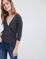 Thumbnail for your product : ASOS Design Wrap Top With Tie Side And Ruched Sleeve Detail In Spot Print