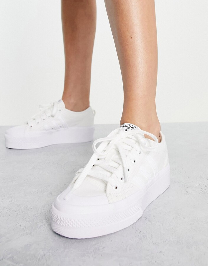 adidas Nizza platform sneakers in white - ShopStyle