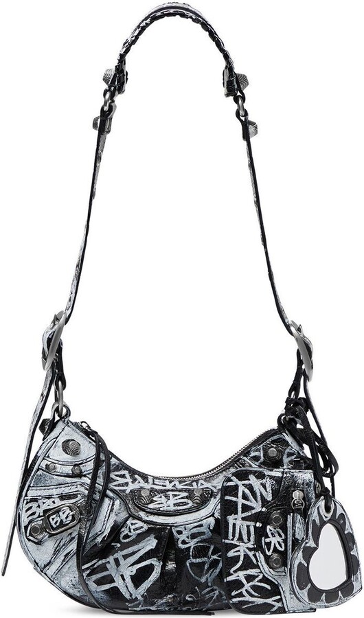 Balenciaga Le Cagole graffiti shoulder bag - ShopStyle