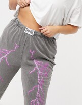 Thumbnail for your product : New Girl Order Curve relaxed joggers with lightning print in vintage wash co-ord