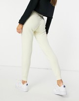 Thumbnail for your product : Nike essential tight fit fleece track pants in off