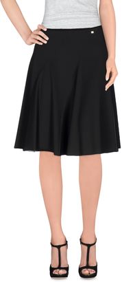 Caractere Knee length skirts