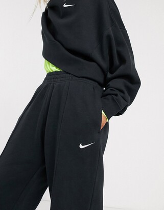 Nike mini Swoosh oversized joggers in black