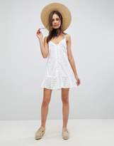 Thumbnail for your product : ASOS DESIGN Cami Button Through Broderie Mini Sundress with Ruffle Hem
