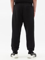 Thumbnail for your product : Palm Angels Palm-print Cotton-jersey Track Pants - Black Pink
