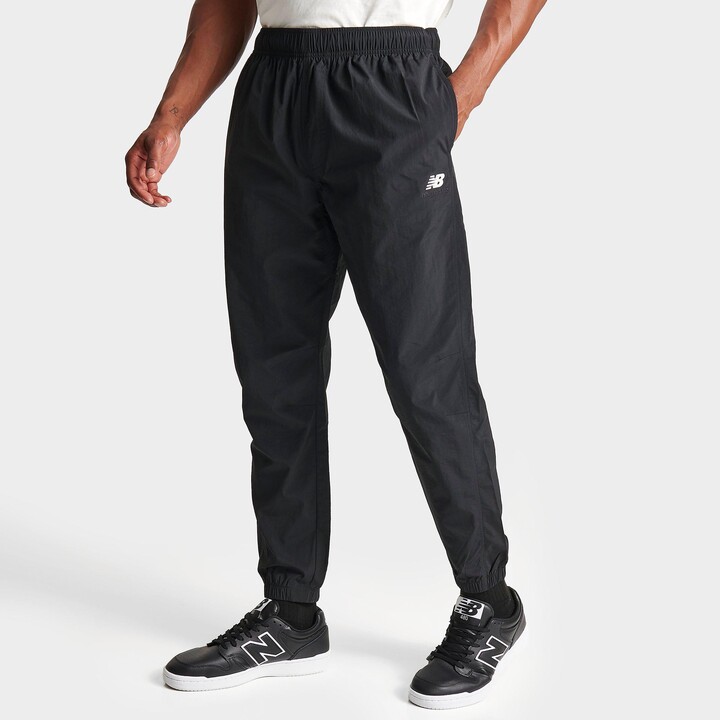 New Balance Men's Sport Essentials Premium Woven Windbreaker Pants